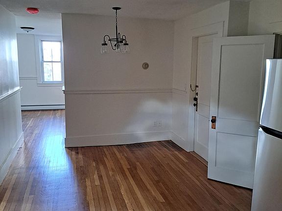 Entry: Looking through apartment to sunny front living area