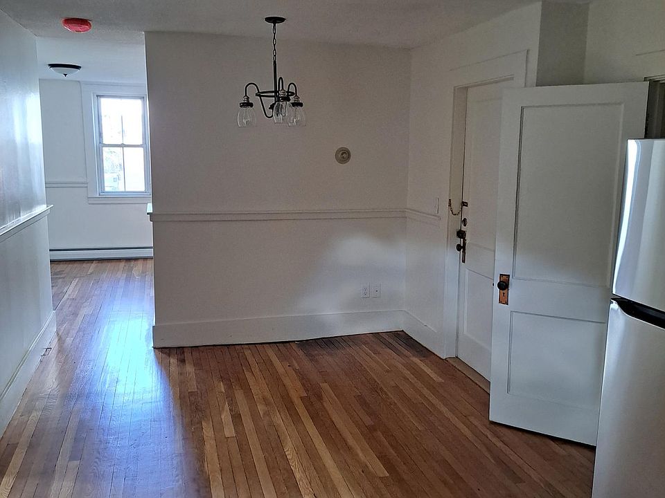 Entry: Looking through apartment to sunny front living area