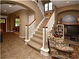 Decorator paint colors, art niches & arches throughout the home.