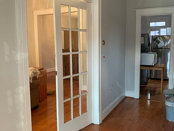 Entrance area . Door to living room and entrance to kitchen area