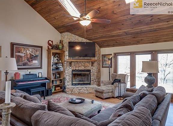 Another view of Greatroom w. corner fireplace