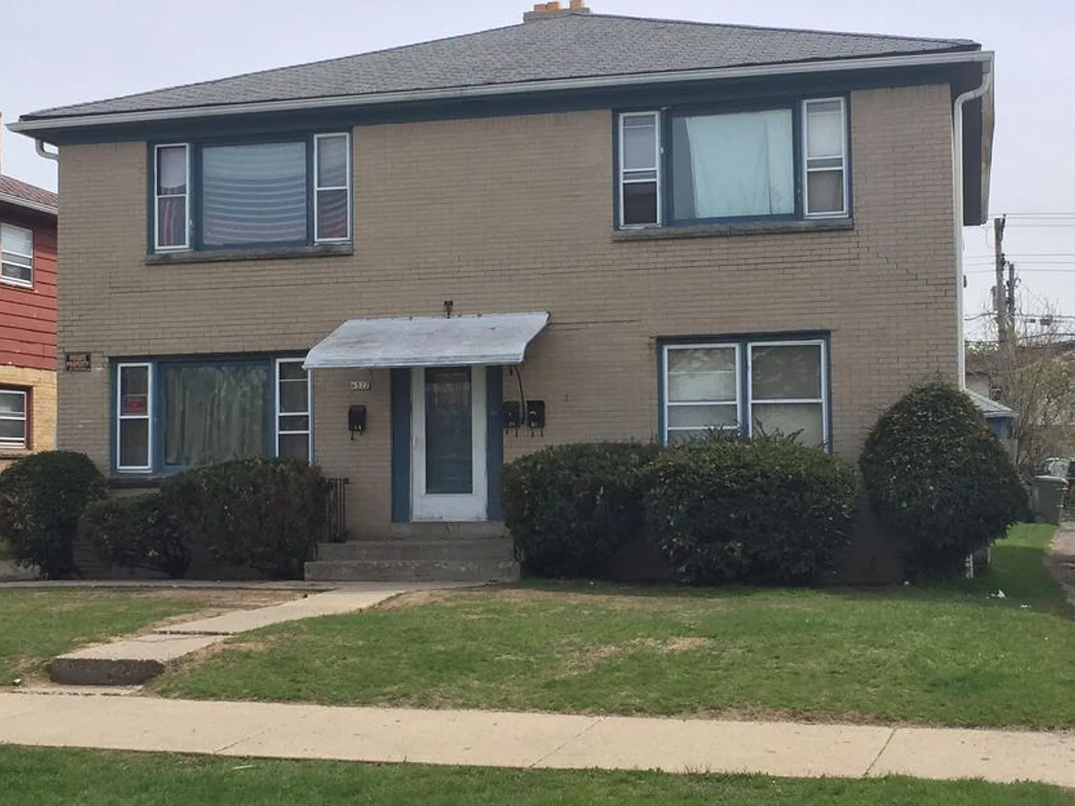 6527 W Keefe Ave Pkwy. (3 Unit) — Photo 1