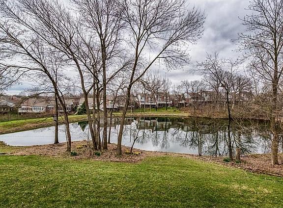 Access the treed & green space surrounding the lake from your walk-out lower level