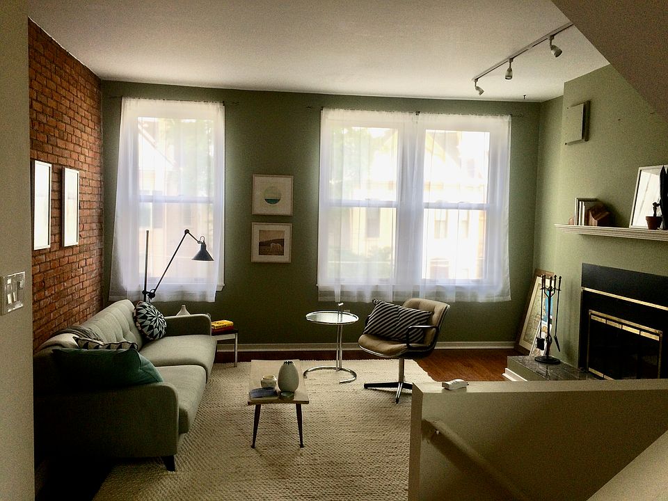 Living room with wood-burning fireplace