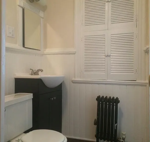 Bathroom, toilet and sink.