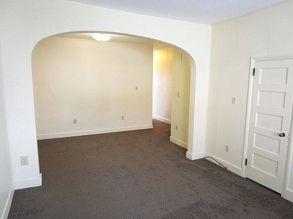 Standing in Living Room Looking Toward Dining Room and Hallway
