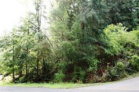 Street view; the property is sloped upward from the street.