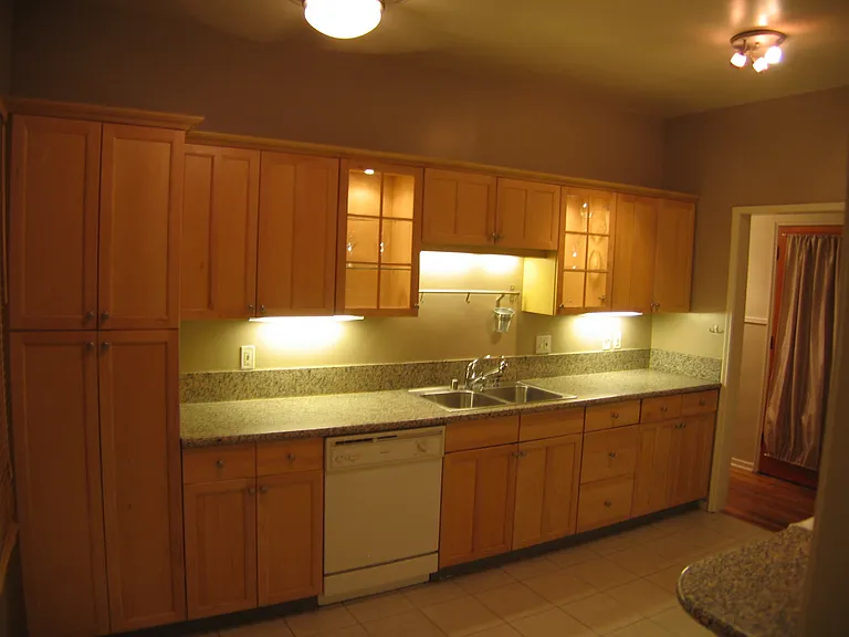 200 Kitchen with built-in pantry left side of photo.