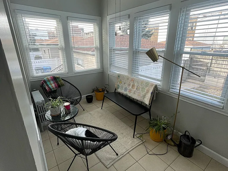 West facing sun room / office at rear of unit