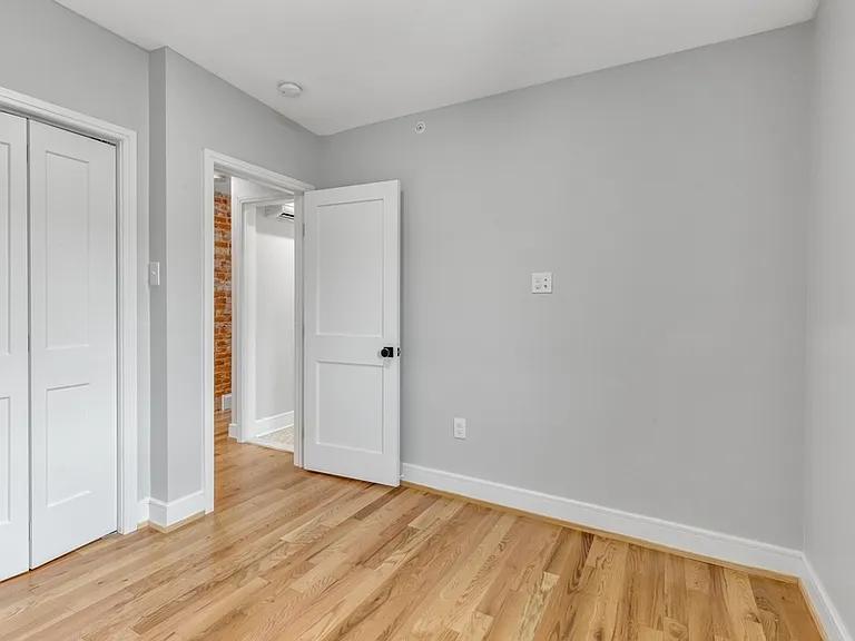 The smaller bedroom has one window and large closet.