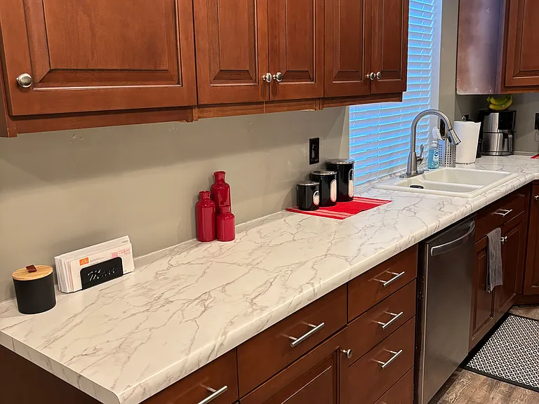 Kitchen - new counter tops and stainless steel appliances.