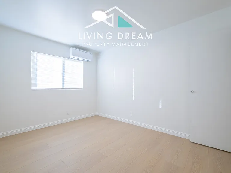 Bedroom 2:
Includes one closet and an air conditioning unit.