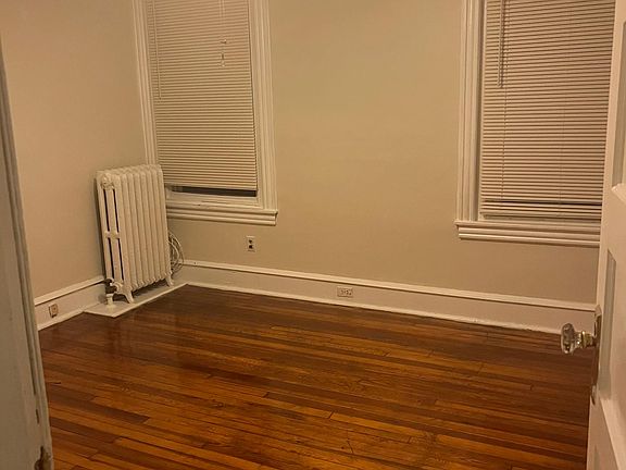 Larger bedroom has 2 windows and 2 small closets