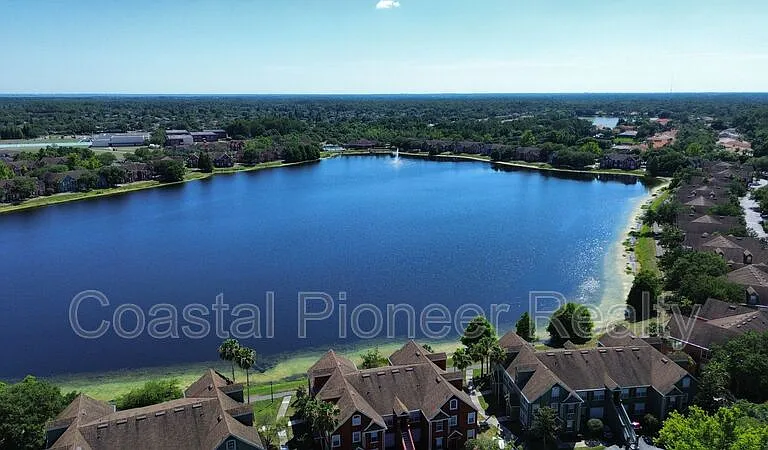 9232 Lake Chase Island Way — Photo 37