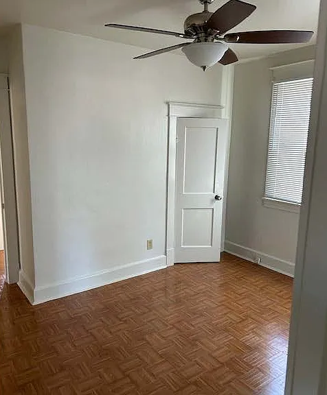 Bedroom with partially open closet door.
