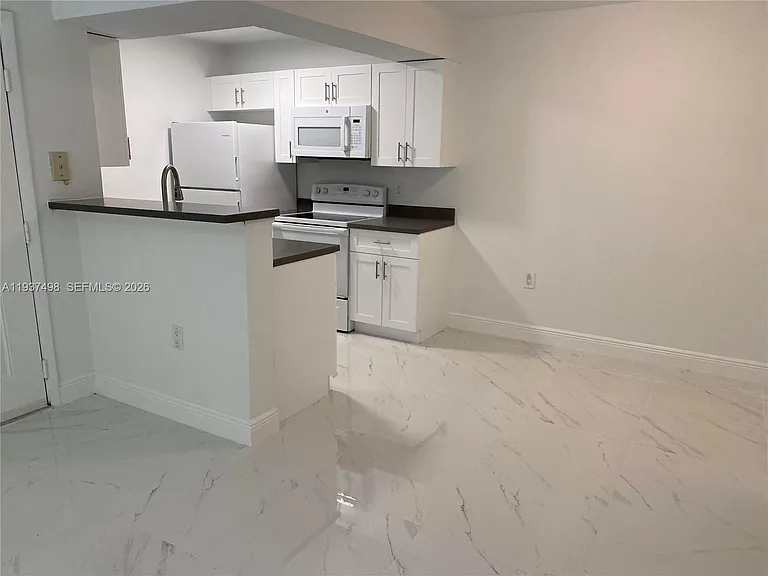 15560 SW 104th Ter #619 — Photo 4
