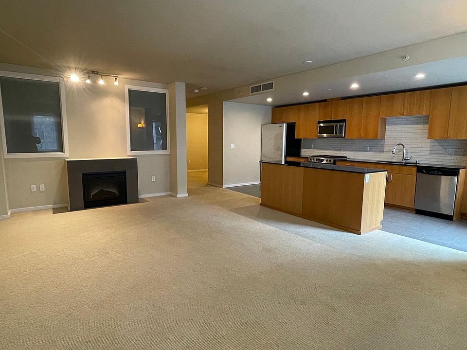 The largest living room for a one bedroom unit in the building and maybe all of Belltown! Host your family!