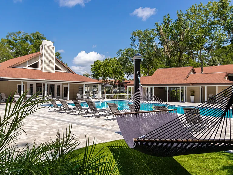 Bask in the serene poolside haven of our hammock garden.