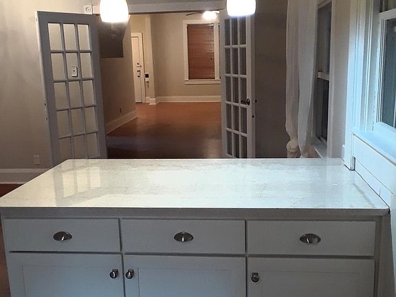 The kitchen has brand new cabinets, marble countertops and i