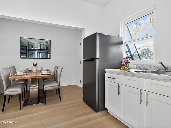Virtually Staged Kitchen with Dining Area