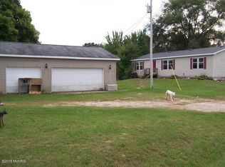 5489 N Gravel Ridge Rd, Coral, MI 49322