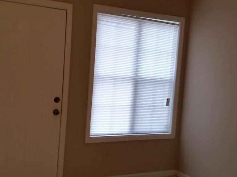 Rear exit and one of the matching windows in the family room