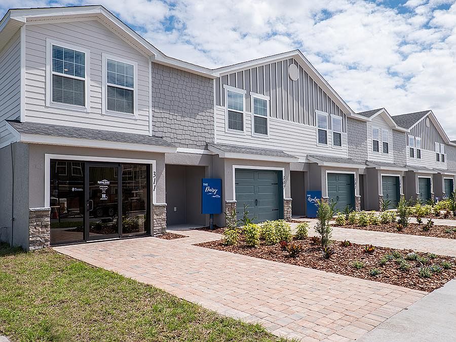 Welcome home to Bridge Pointe, offering beautiful new townhomes for sale in St. Cloud, Florida!