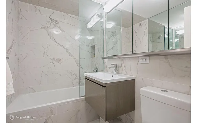 Sold by Douglas Elliman | media 18