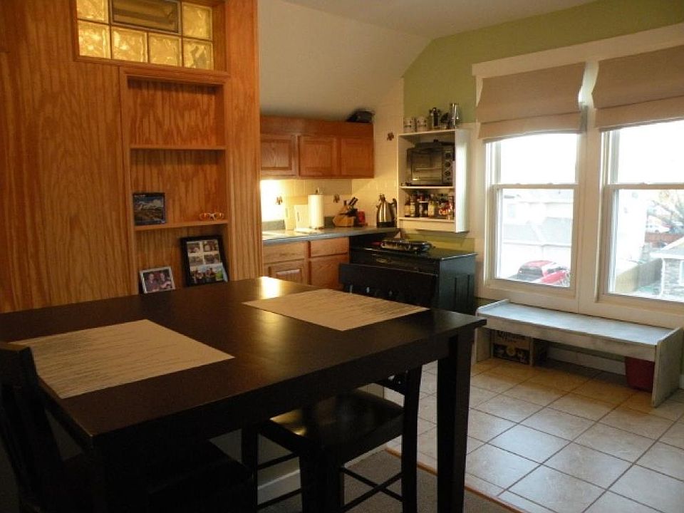 View of the preparation and cooking area from dining table.