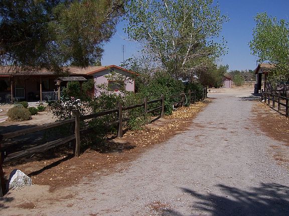 Driveway-curves to left to exit another electric gate
