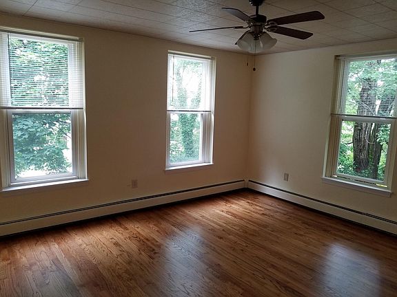 Refinished 1910 original hardwood floors in this 15 X 15 living room.