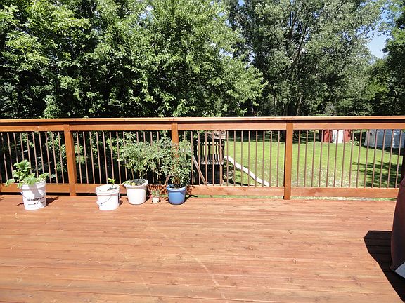 View off of your deck into the fenced-in huge back yard