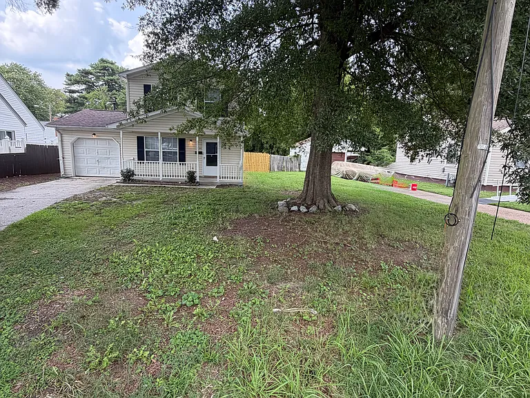 Front of the house showing the driveway