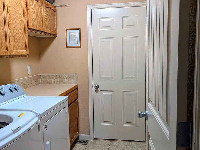 Shared laundry room (and door to garage)