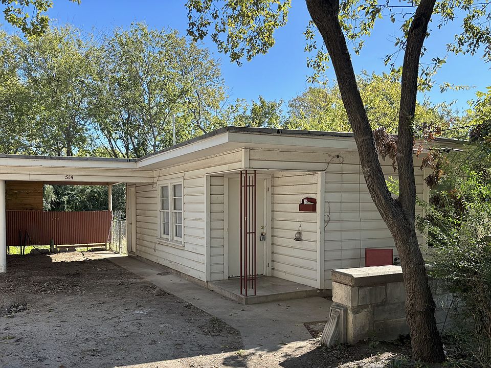 front of house with attached carport