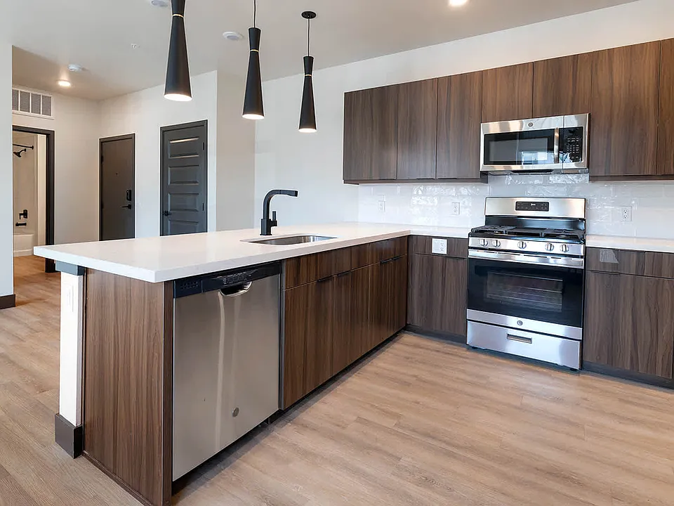 Kitchen with Quartz Countertops and Stainless Steel Appliances
