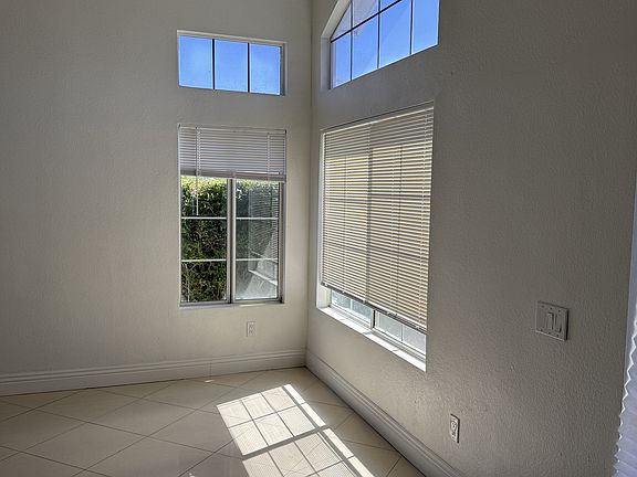 Living room corner showing abundance of natural light this room gets.