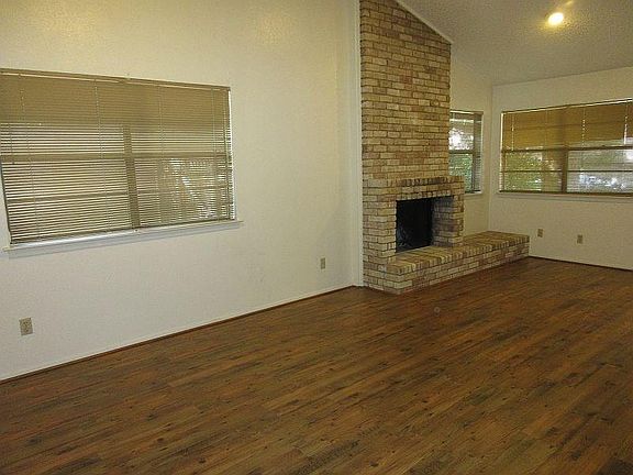 Living area with laminate floors.