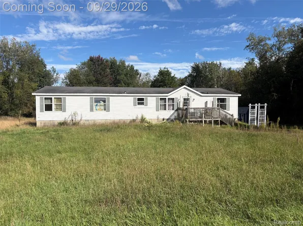 9381 21 Mile Rd, Sand Lake, MI 49343