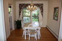 FORMAL DINING RM WITH HARDWOOD FLOORING