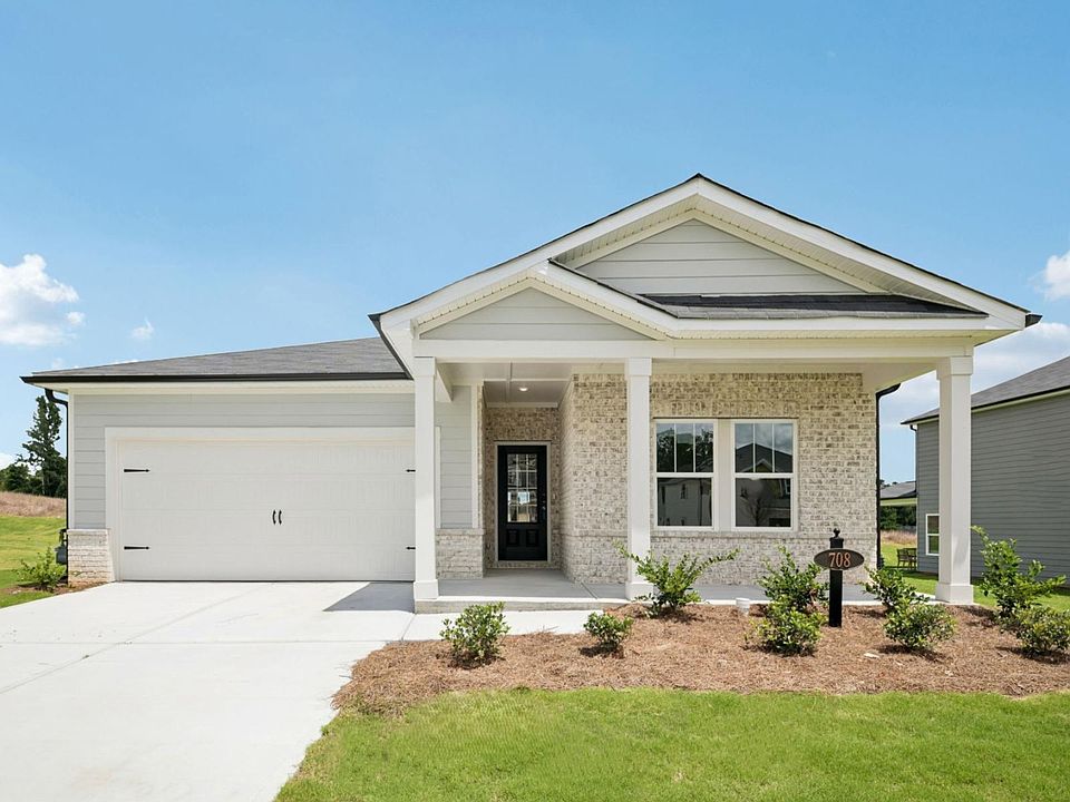 The Newport floorplan with Elevation C modeled at Northwoods at Mirror Lake.