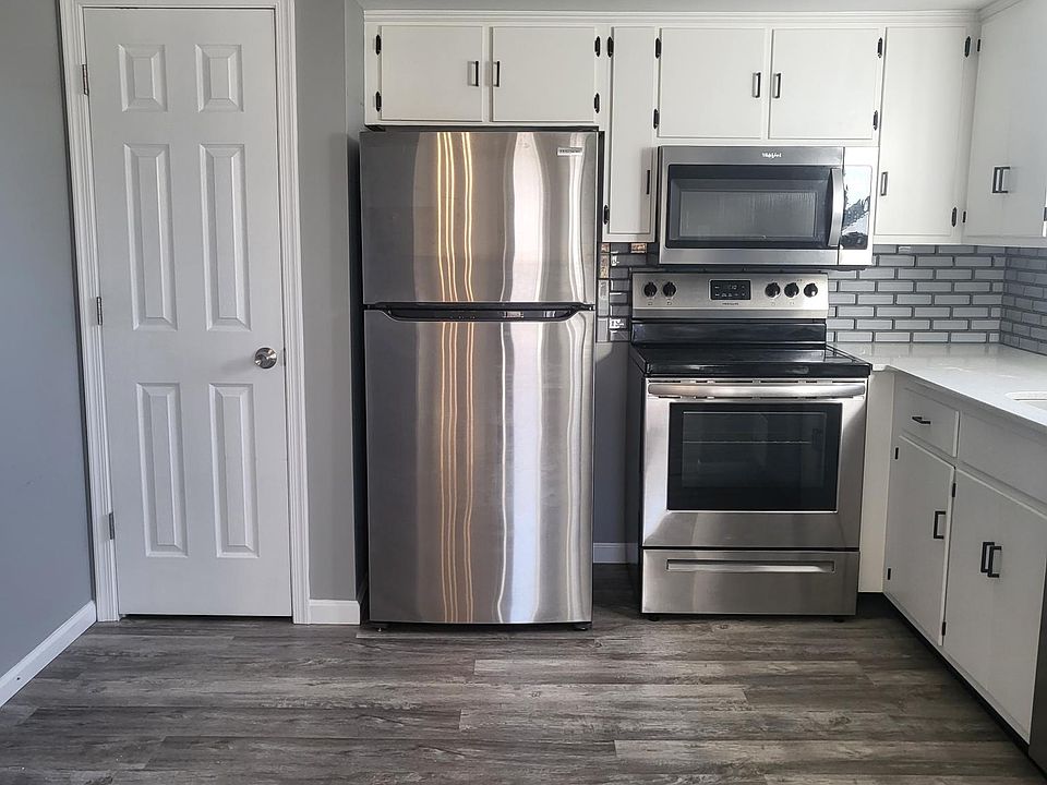 Kitchen with SS appliances and Pantry