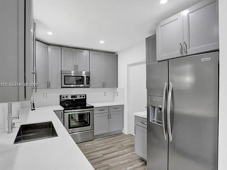 236 NW 42nd St — Photo 16