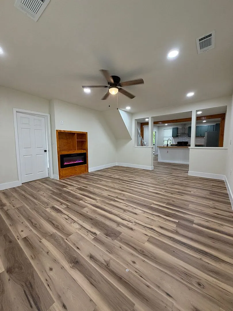 Updated 3-bedroom, 2-bath rental in Muskogee situated on a spacious 0.28-acre lot. — Photo 3