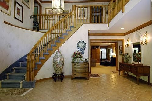 TWO STORY FOYER WITH CATWALK