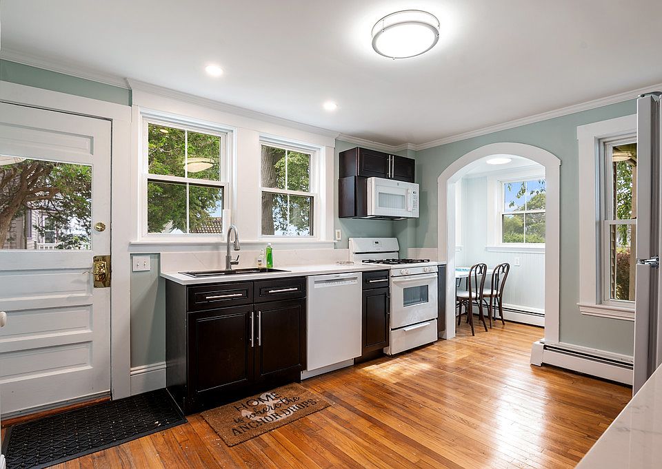 Spacious kitchen with all the essentials for your cooking needs, with views of the boat channel!