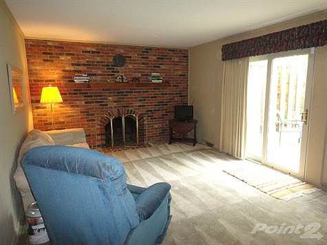 Large Family Room with Brick Wood Burning Fireplace