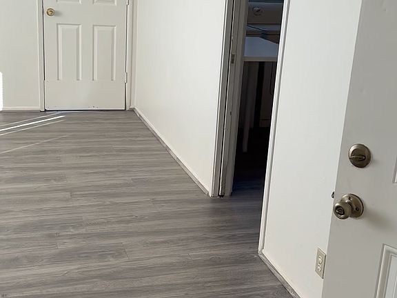 living room and back door to staircase