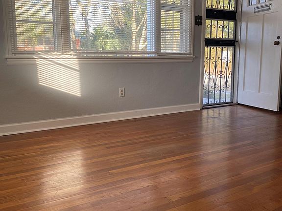 VIEW OF ENTRY STORM DOOR FROM LIVING ROOM
