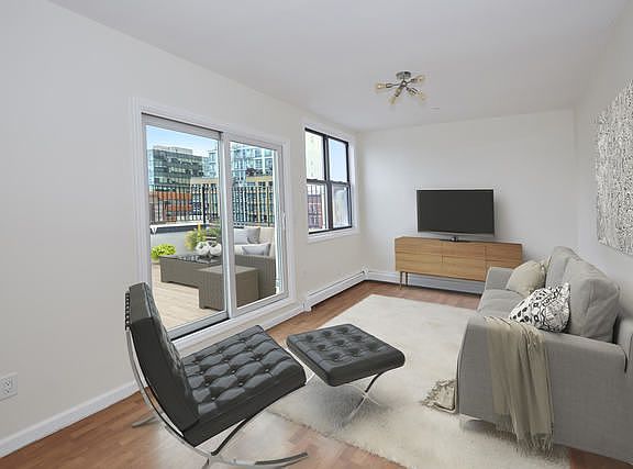 3rd image of 207 E 120th St #Penthouse